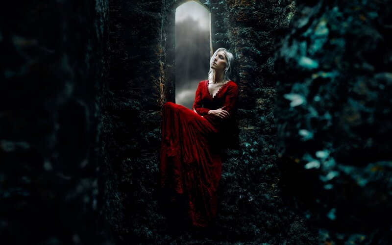 Woman in Red Dress — Dramatic, Night, Photograph, Stone Wall