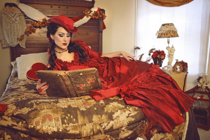 Woman in Red Dress — Dramatic, Photograph, Bed, Book