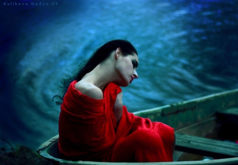 Woman in Red Dress — Dramatic, Photograph, Boat