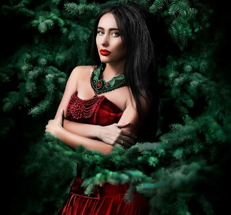 Woman in Red Dress — Dramatic, Photograph, Green Pine Branches
