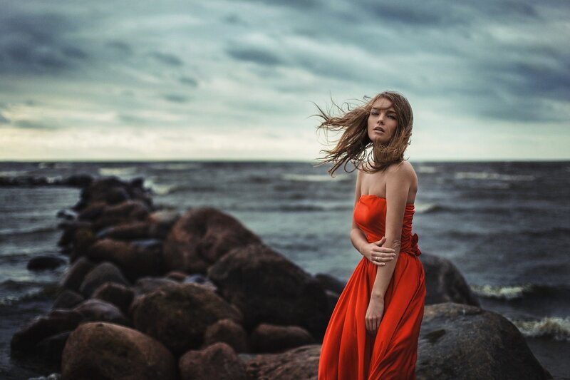 Woman in Red Dress — Dramatic, Photograph, Ocean, Rocks