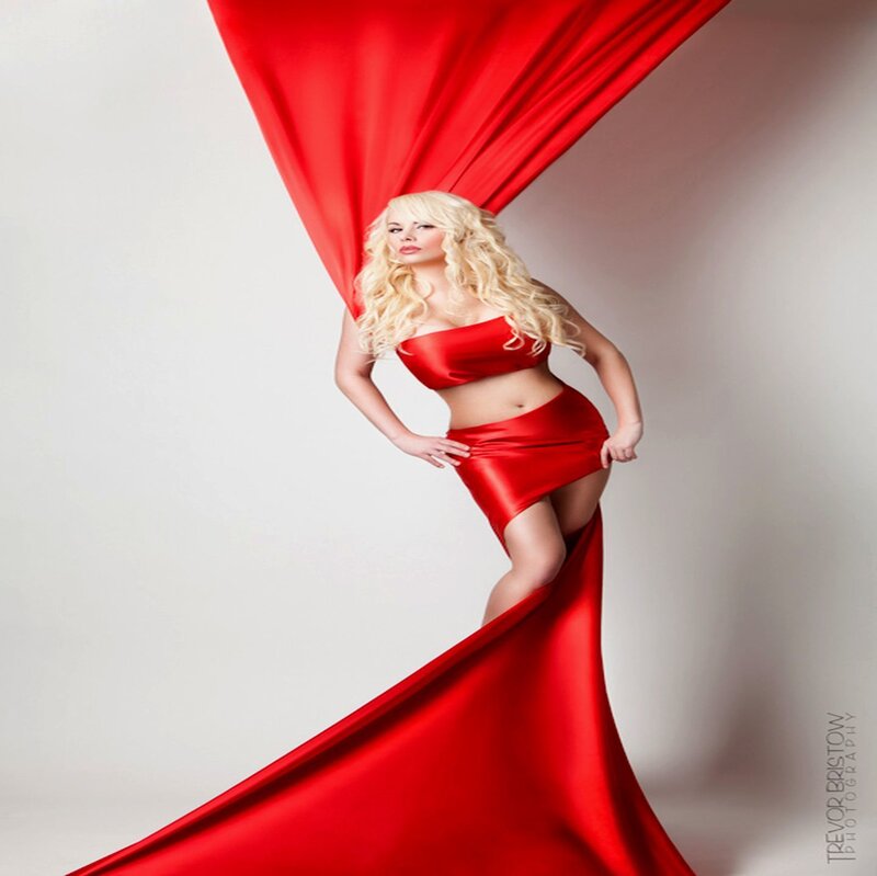 Woman in Red Dress — Dramatic, Photograph, Red Fabric, Studio Background