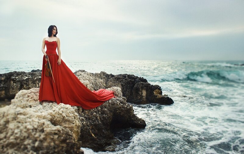 Woman in Red Dress — Dramatic, Photograph, Violin, Rocks