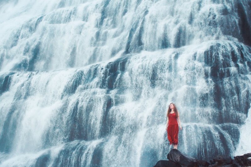 Woman in Red Dress — Dramatic, Photograph, Waterfall, Rocks