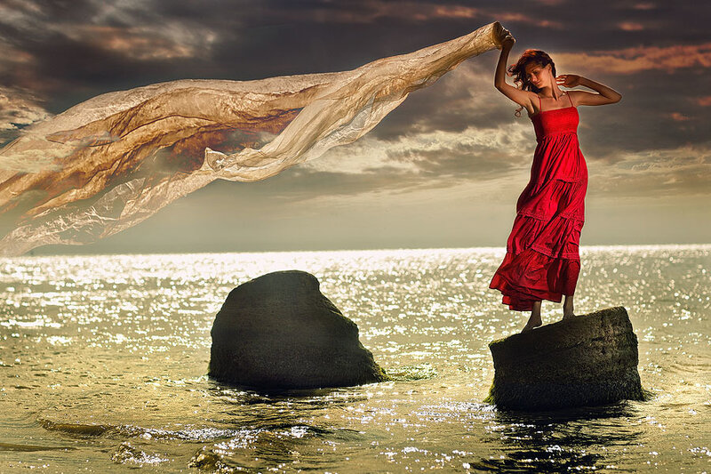 Woman in Red Dress — Dramatic, Sunset, Photograph, Rocks