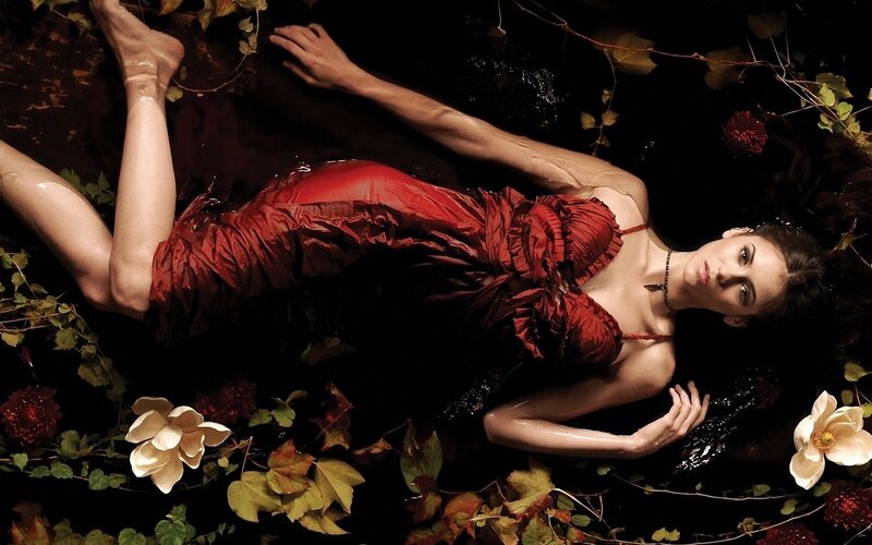 woman in red dress floating