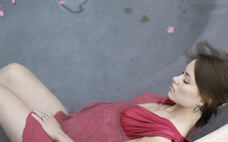 woman in red dress floating