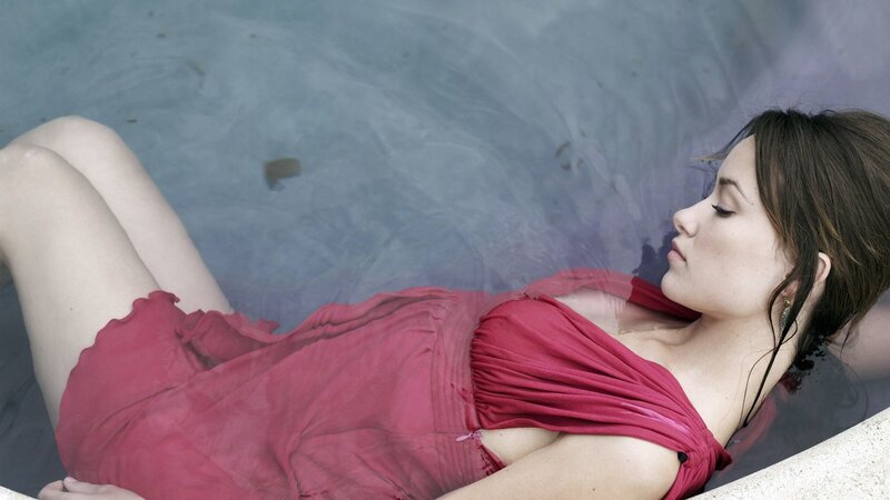 woman in red dress floating