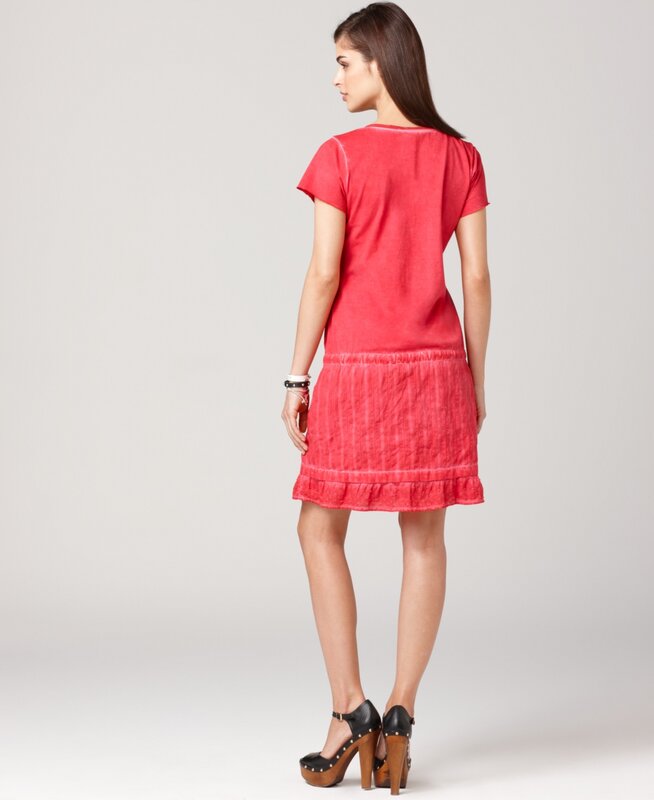 woman in red dress from back