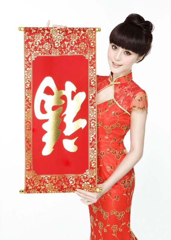 Woman in red dress holding scroll