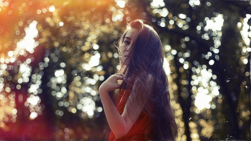 woman in red dress in forest