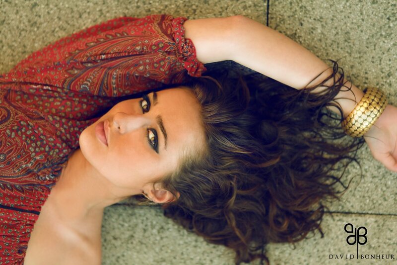 woman in red dress lying down