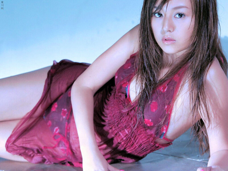 woman in red dress lying down