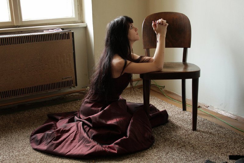 Woman in Red Dress — Maroon, Contemplative