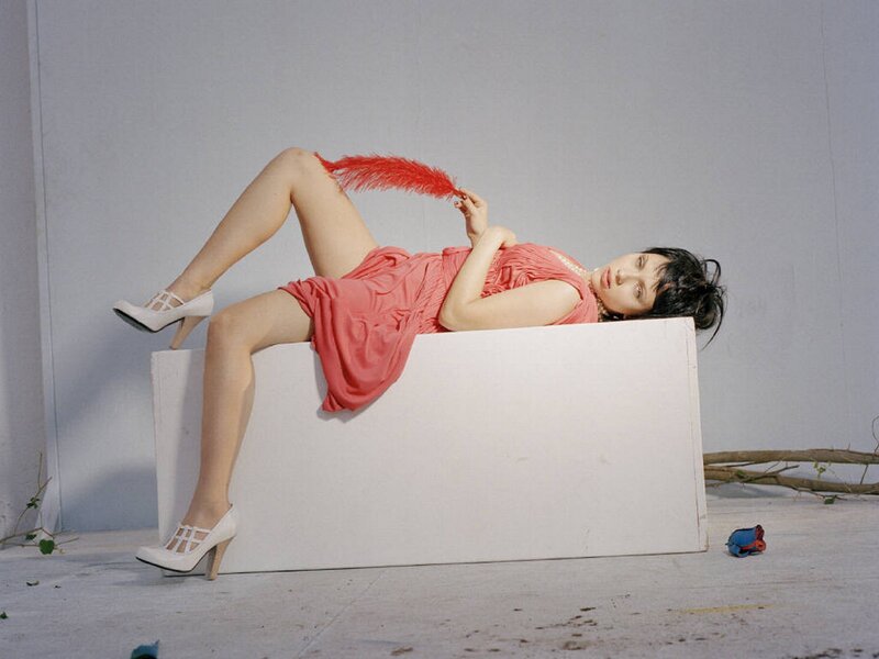 Woman in Red Dress — Neutral, Photograph, Feather