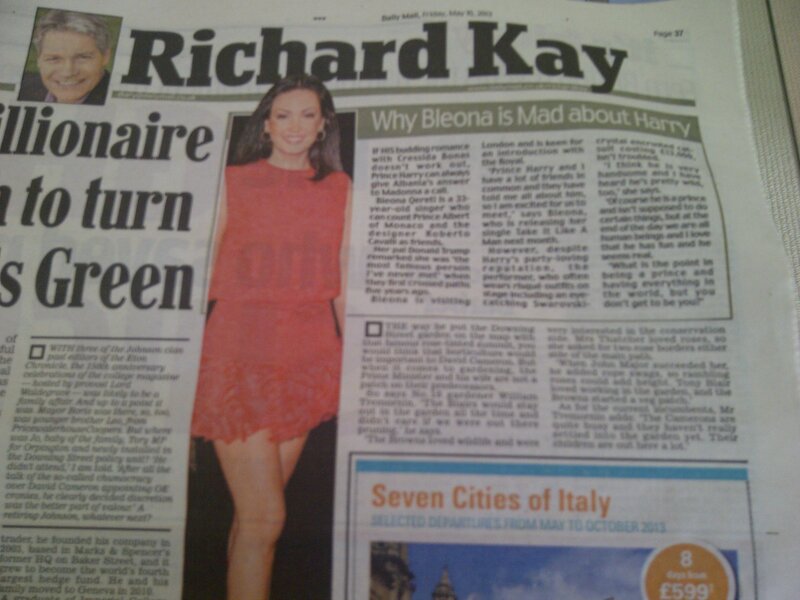 Woman in Red Dress — Neutral, Photograph, Newspaper
