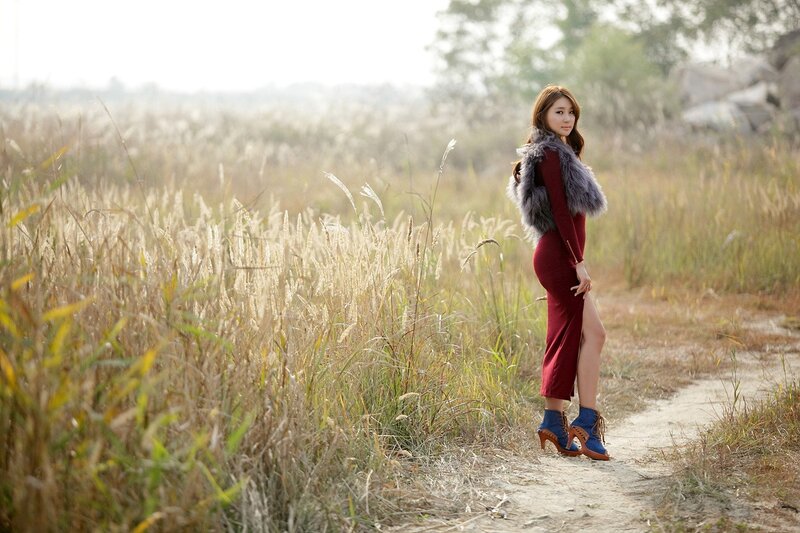 Woman in red dress on a path