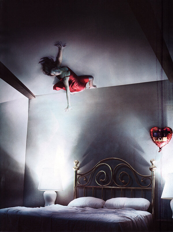 Woman in red dress on ceiling