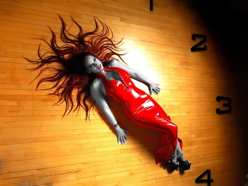 Woman in red dress on clock floor