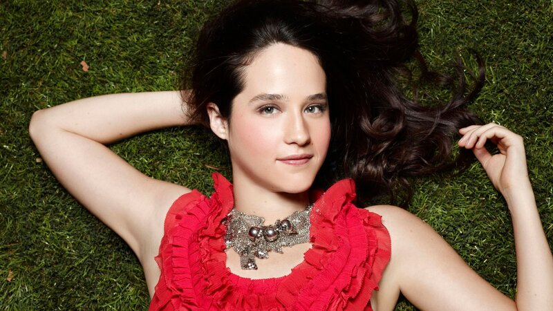 woman in red dress on grass