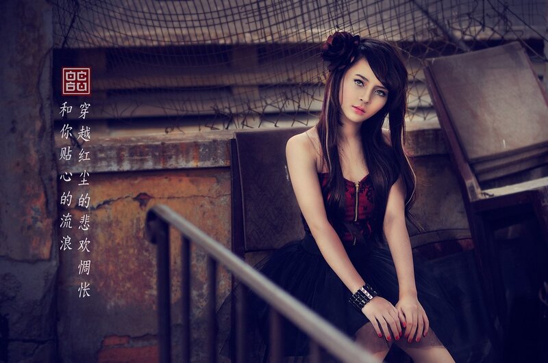 woman in red dress on stairs