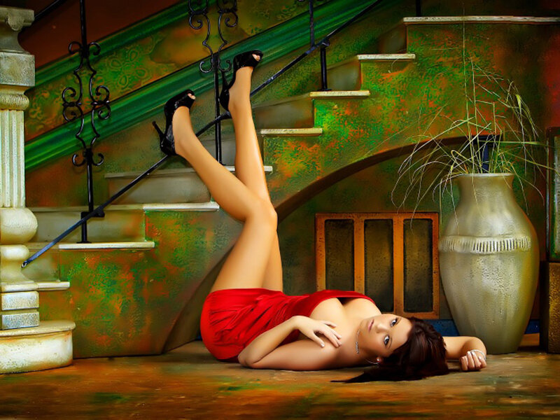 Woman in red dress on stairs