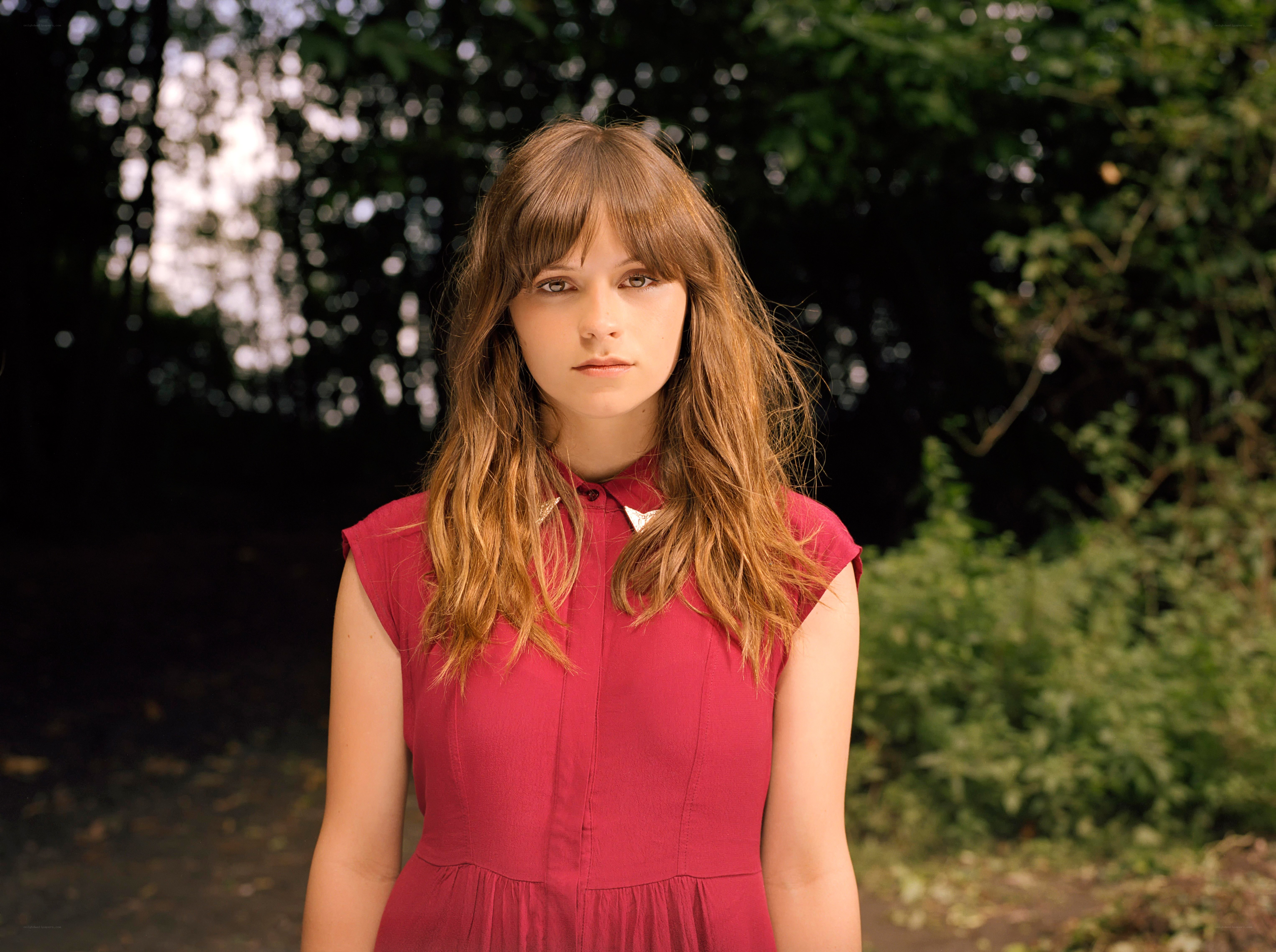 woman in red dress outdoors