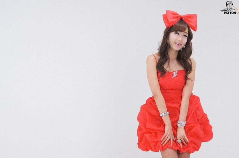 Woman in Red Dress — Playful, Photograph, Bow