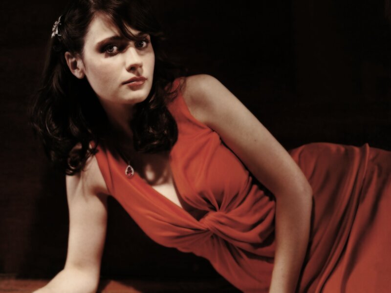 woman in red dress posing