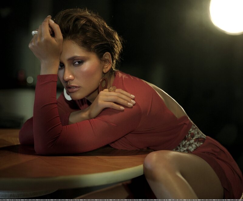 woman in red dress posing