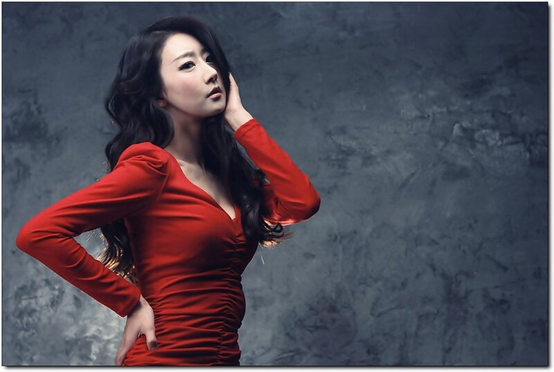 woman in red dress posing