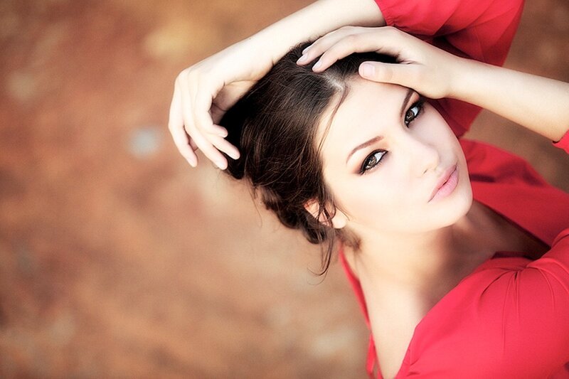 woman in red dress posing