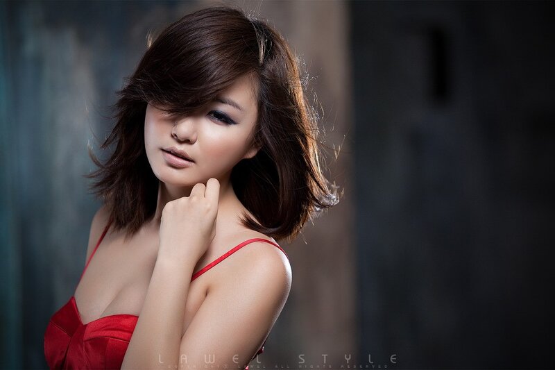 woman in red dress posing