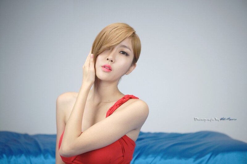 woman in red dress posing