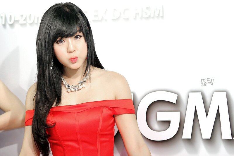 woman in red dress posing
