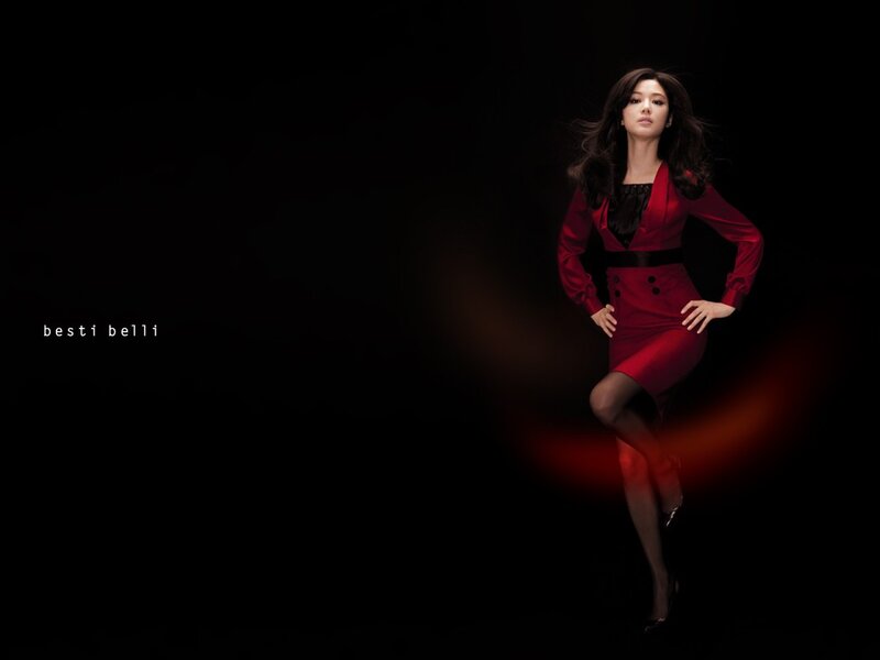 woman in red dress posing
