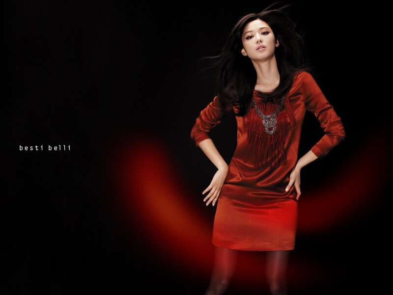woman in red dress posing