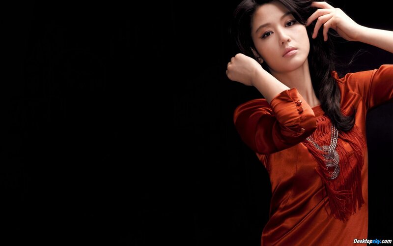 woman in red dress posing