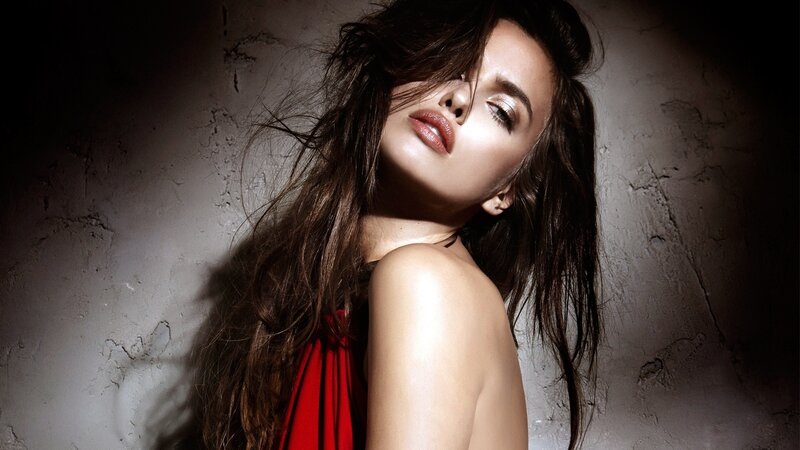woman in red dress posing