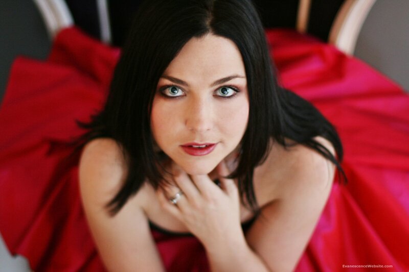 woman in red dress posing