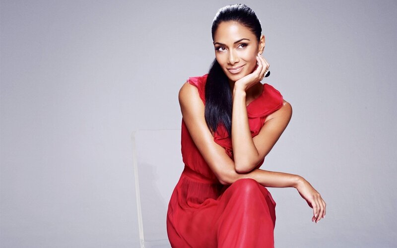woman in red dress posing