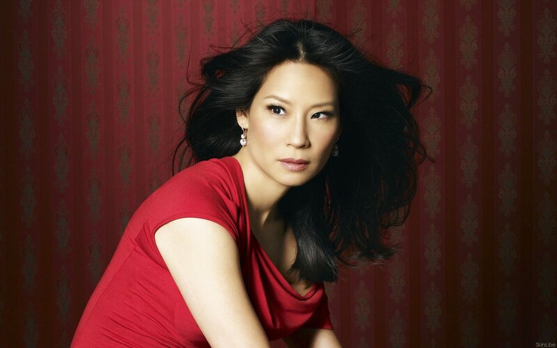woman in red dress posing