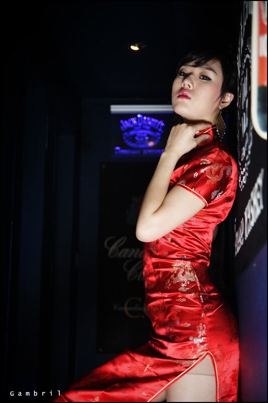 woman in red dress posing