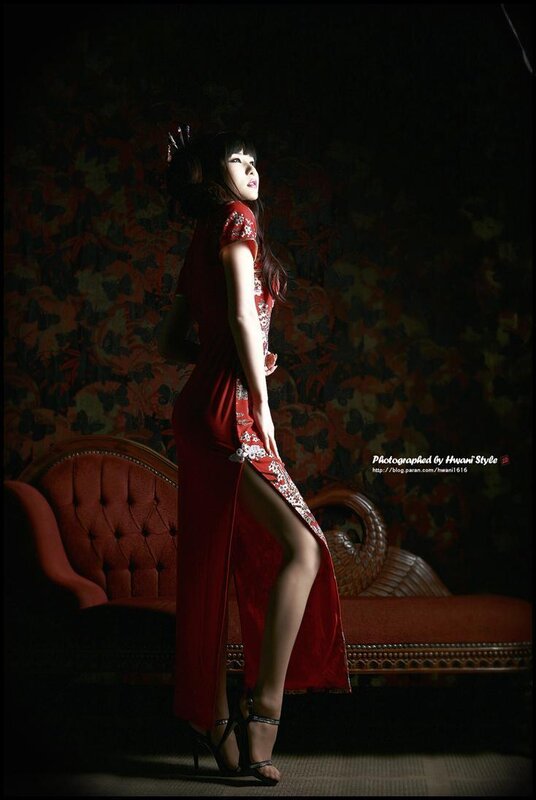 woman in red dress posing