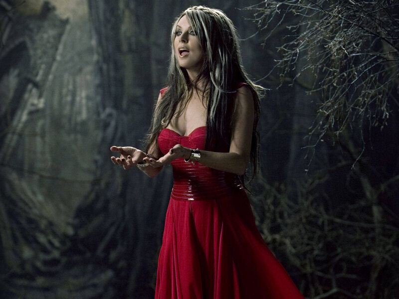 woman in red dress singing