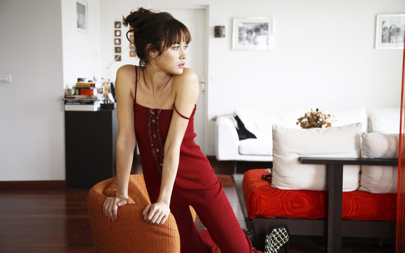 woman in red dress sitting on chair