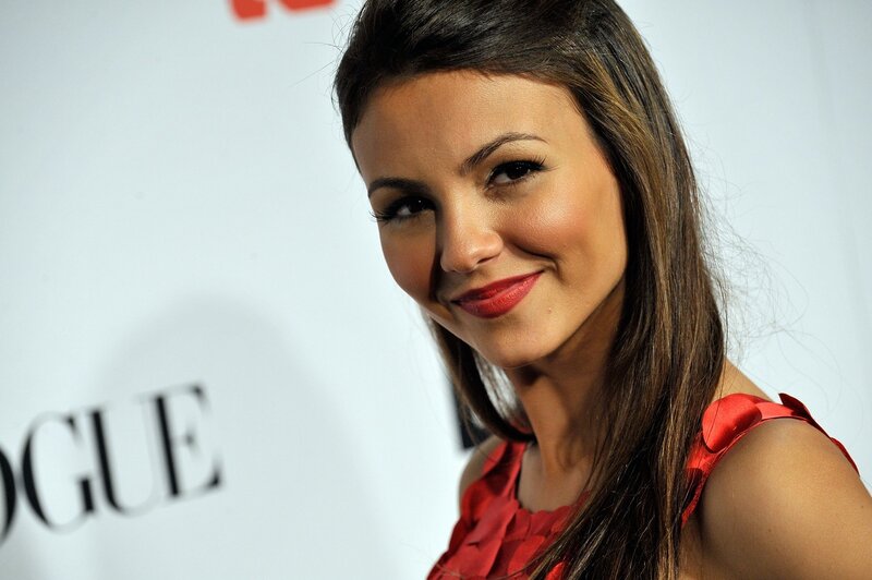 woman in red dress smiling