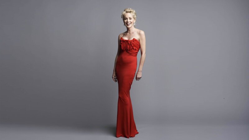 woman in red dress smiling