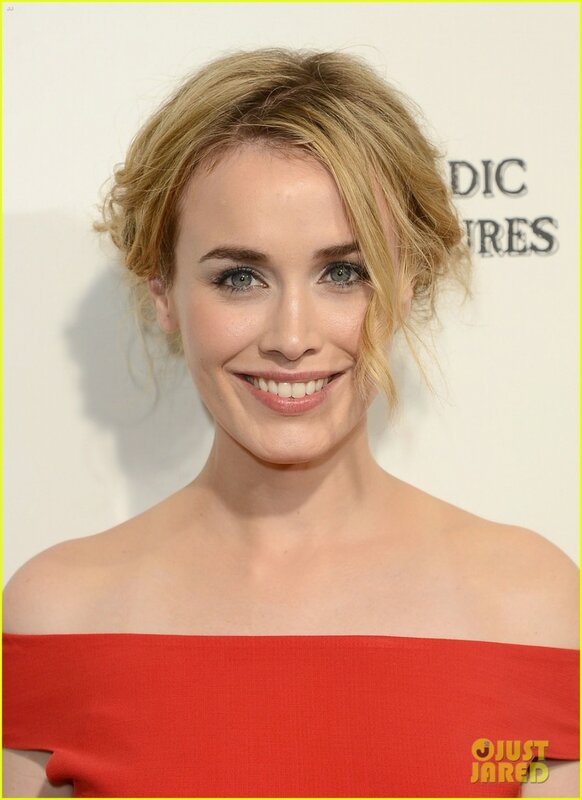 woman in red dress smiling