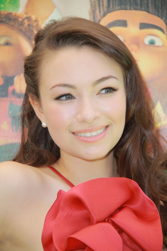 woman in red dress smiling